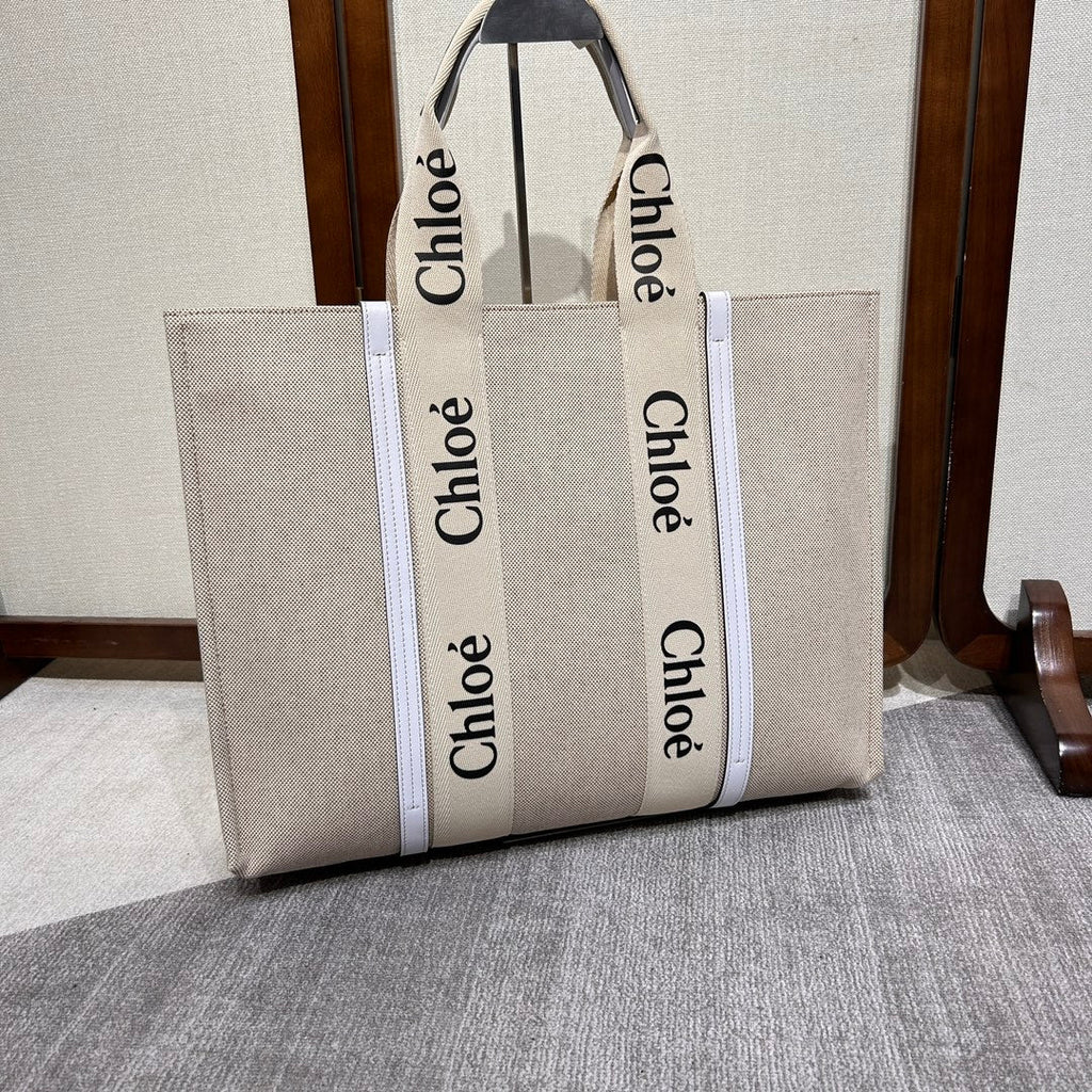 LAGRE WOODY TOTE BAG 45 IN BEIGE LINEN CANVAS BLACK WEBBING LOGO EMBROIDER WHITE CALFSKIN