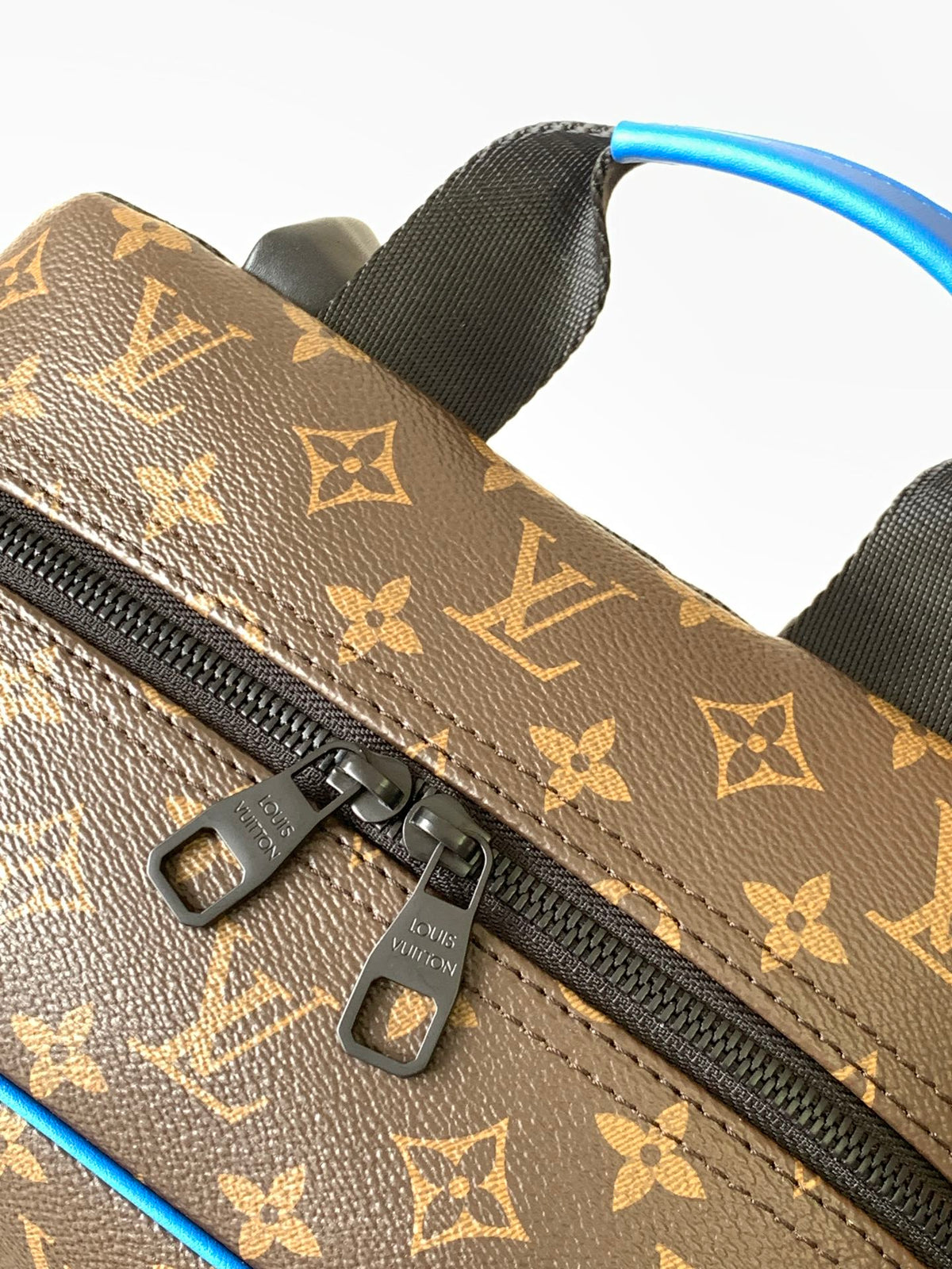 LOUIS VUITTON DEAN BACKPACK 42 IN BLUE AND BROWN MONOGRAM CANVAS