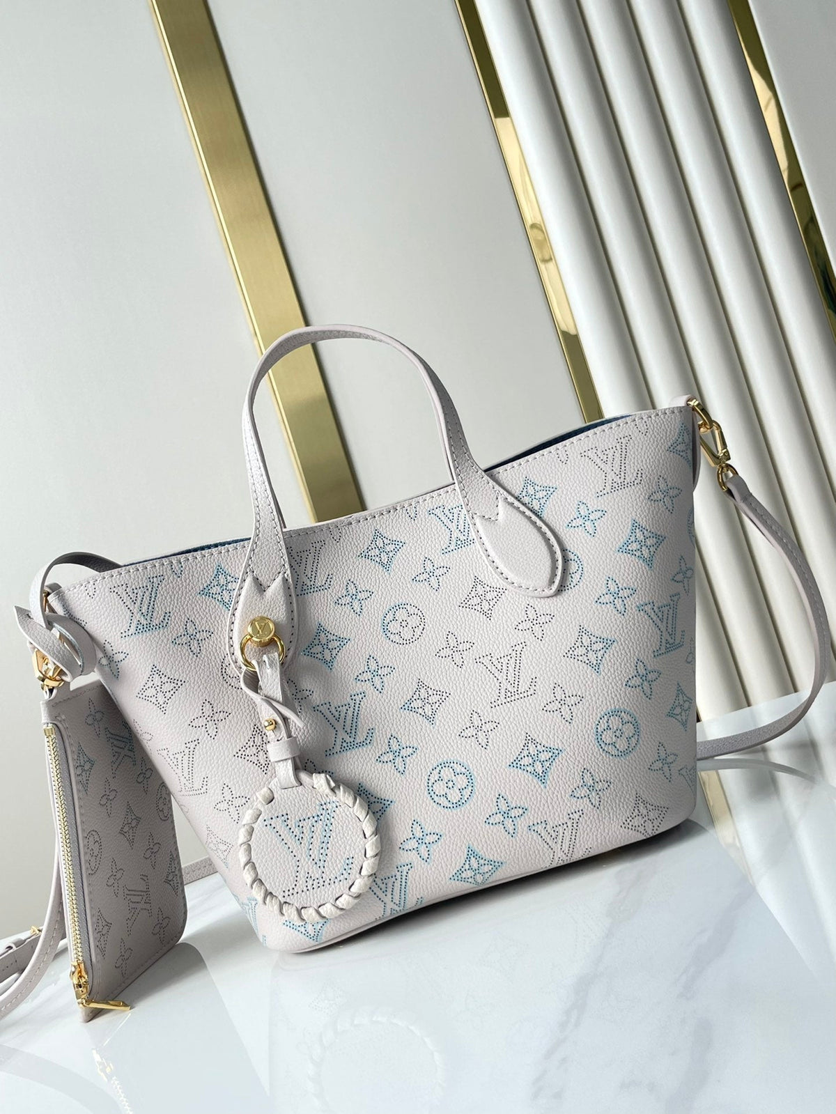 LOUIS VUITTON BLOSSOM PM 20 IN BLUME PERFORATED CALFSKIN