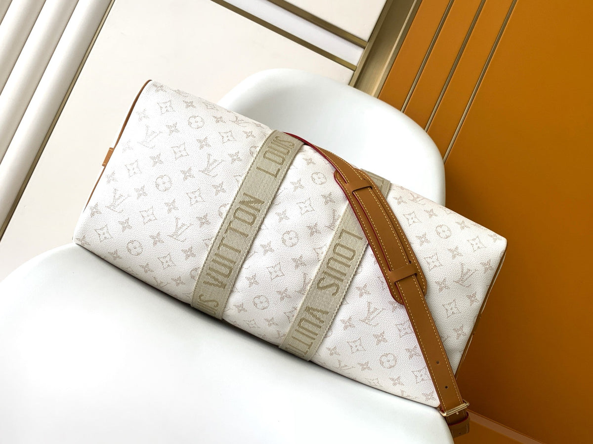 LOUIS VUITTON LV 25S KEEPALL BANDOULIÈRE BAG 45 IN WHITE MONOGRAM HERITAGE CALFSKIN